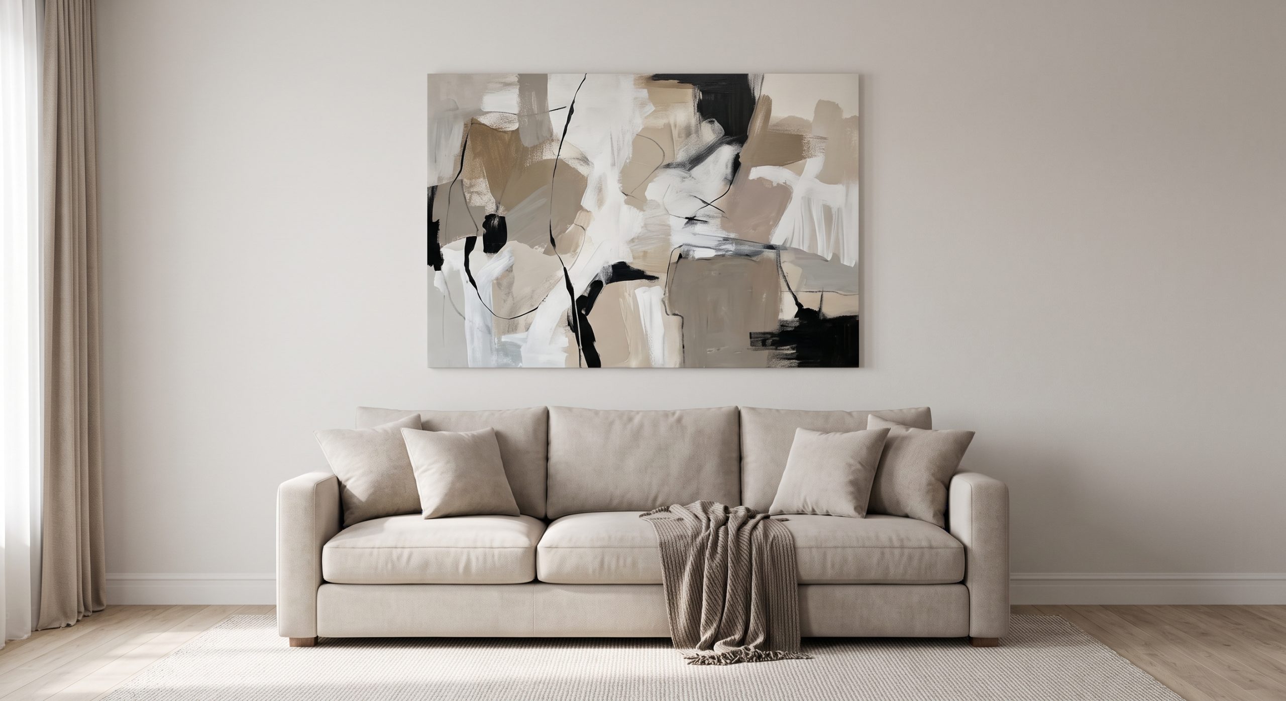 Living room wall showing an artwork correctly scaled above a sofa, spanning roughly three-quarters of its width