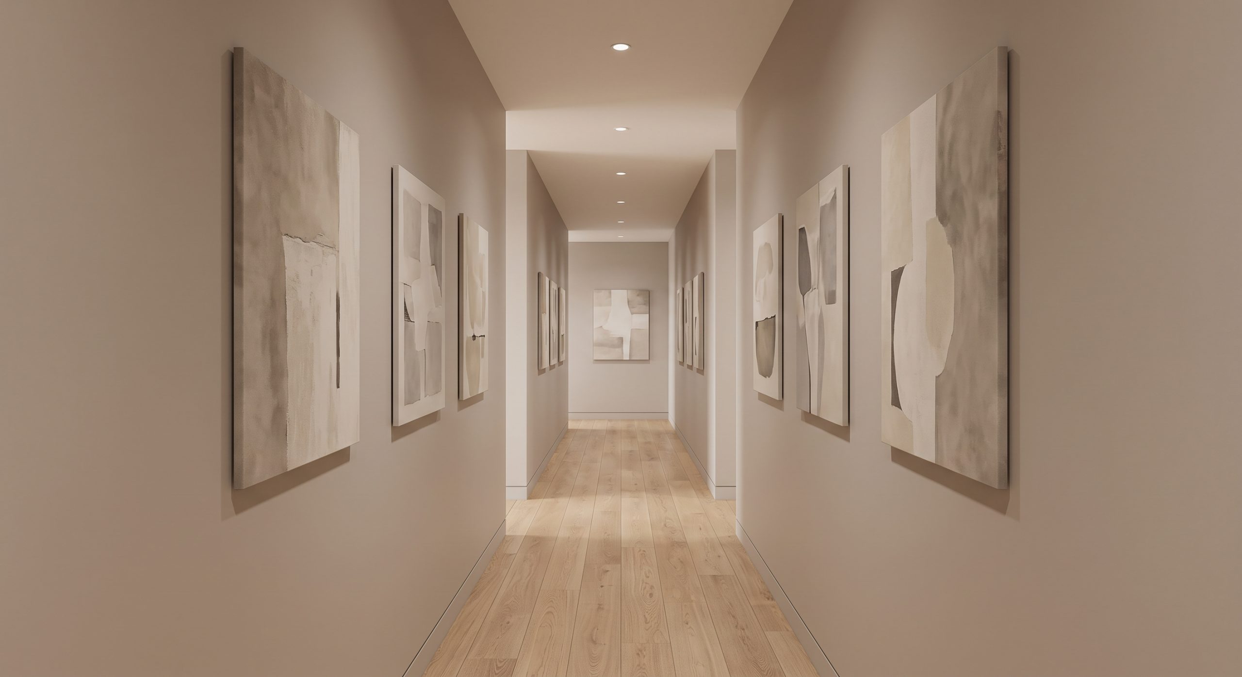 Hallway with art hung at eye level along a corridor at a consistent height