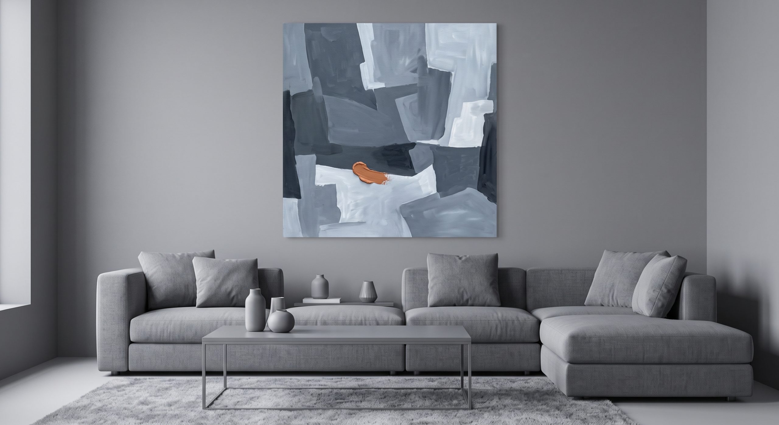 Cool grey living room with one artwork carrying a small warm clay accent as a deliberate contrast