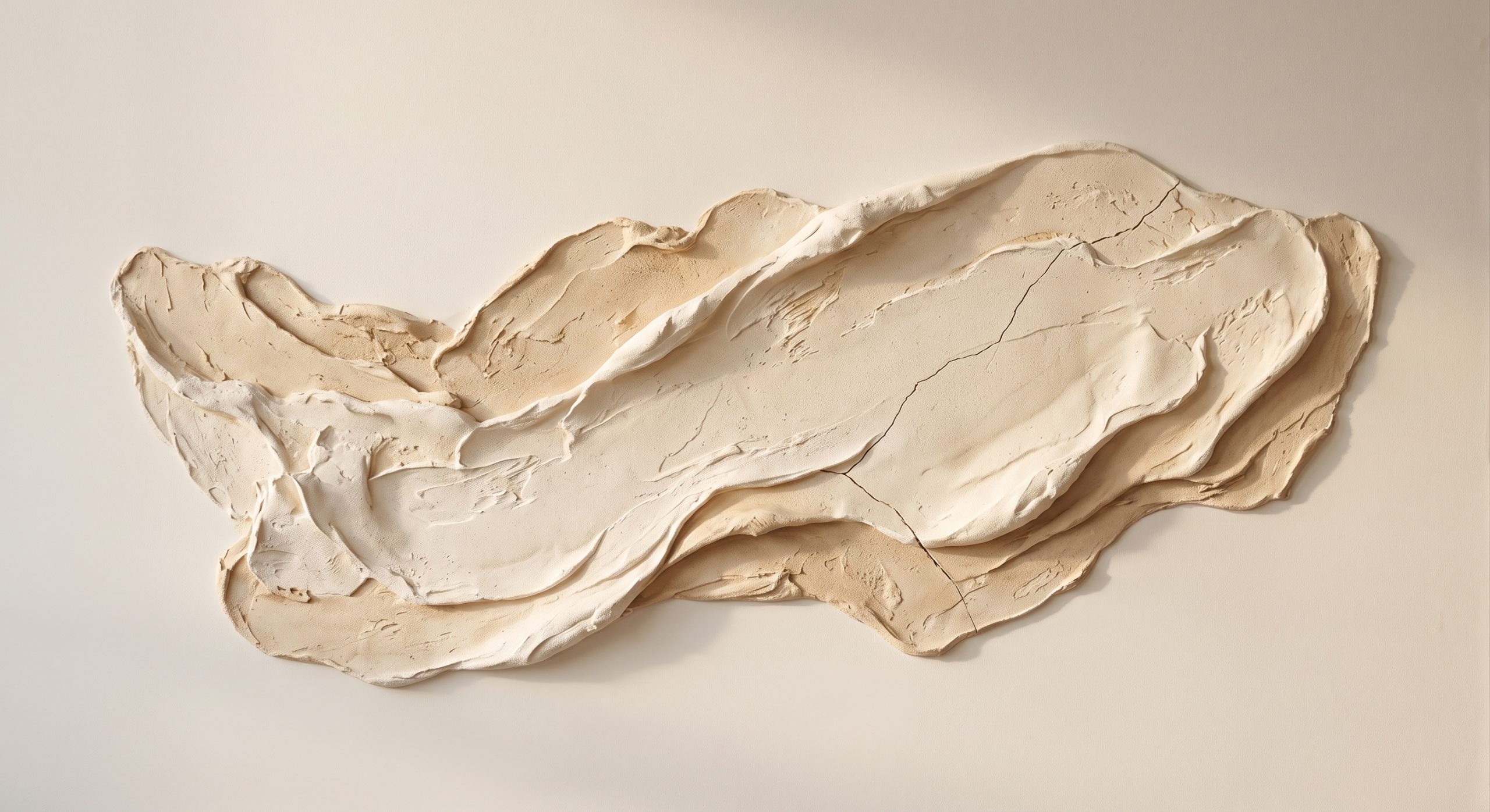 Large textured abstract artwork in warm ivory and sand with raised plaster relief and one fine fracture