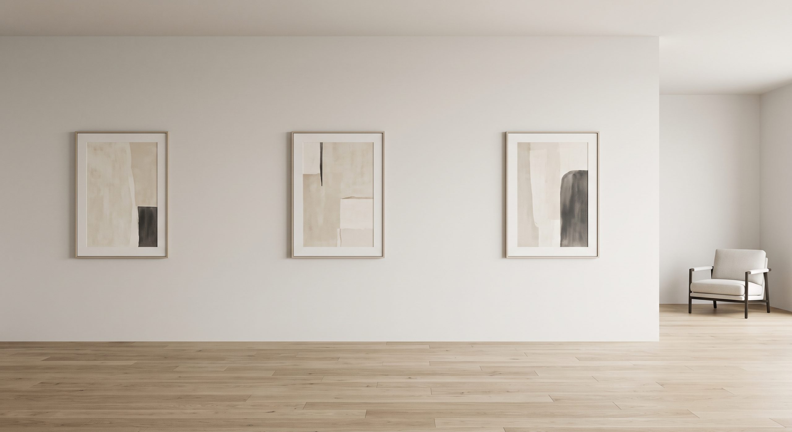 A minimal gallery wall of just three artworks with generous spacing