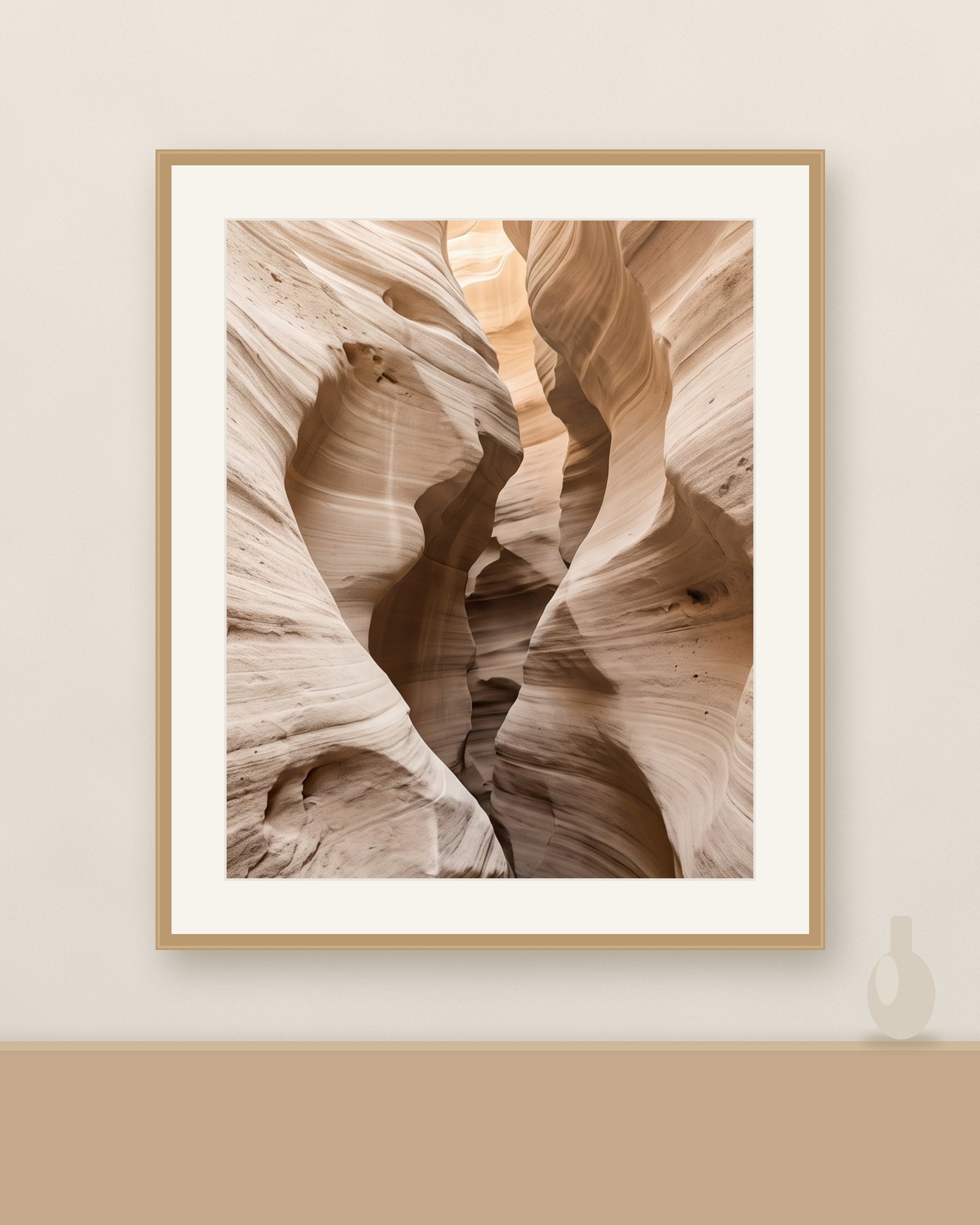 Canyon Passage in a pale oak frame with a white mount, on a warm limewash wall above a shelf with a stoneware vase