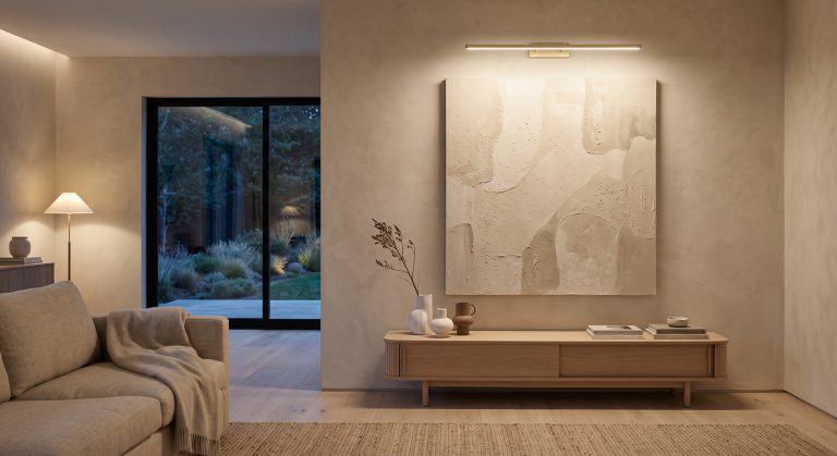 Cordless picture light above artwork with no visible cable